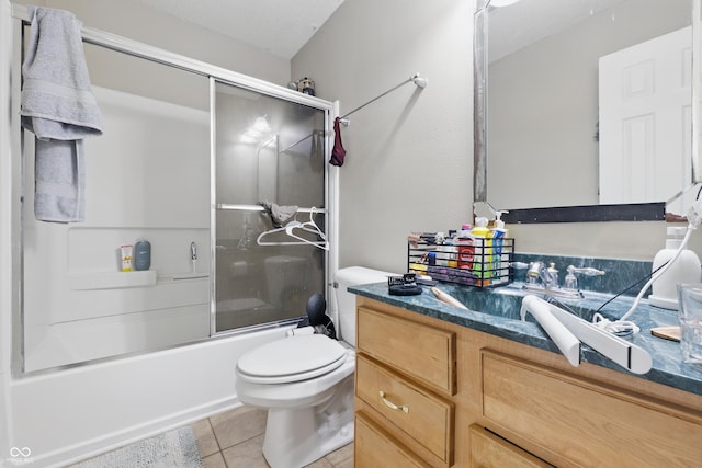 621 Fireside Dr, Greenwood, IN 46143 - full bathroom with vanity, toilet, enclosed tub / shower combo, and tile patterned floors