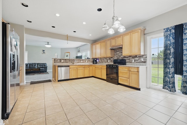621 Fireside Dr, Greenwood, IN 46143 - kitchen featuring stainless steel appliances, under cabinet range hood, light brown cabinetry, light countertops, and a peninsula