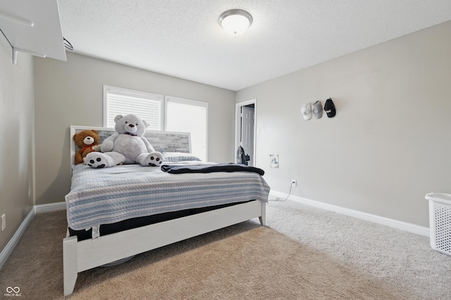 621 Fireside Dr, Greenwood, IN 46143 - bedroom with carpet flooring, baseboards, and a textured ceiling