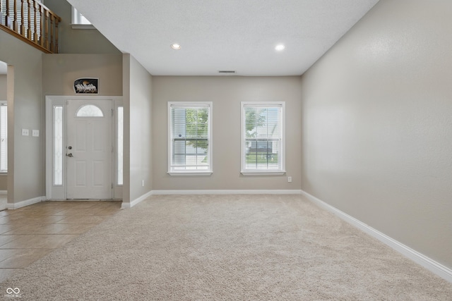 621 Fireside Dr, Greenwood, IN 46143 - carpeted entrance foyer featuring baseboards and recessed lighting