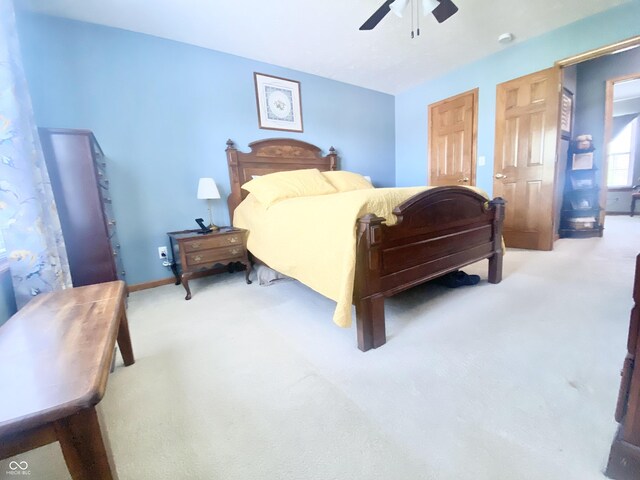 bedroom featuring a ceiling fan and carpet floors