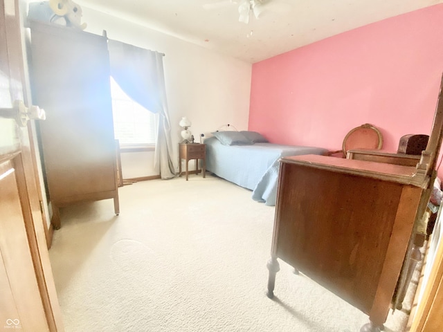 bedroom featuring carpet and a ceiling fan