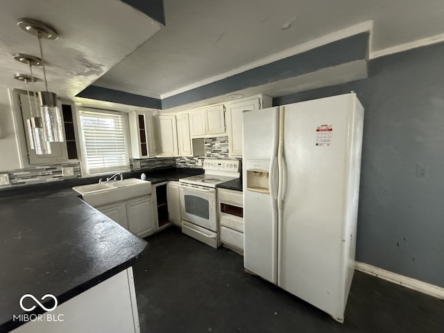 kitchen featuring dark countertops, decorative backsplash, a sink, and white appliances