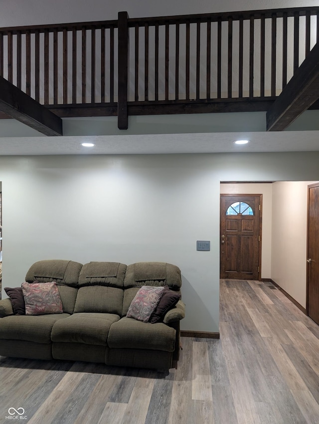 8017 Dogwood Ct, Plainfield, IN 46168 - living area featuring wood finished floors, a towering ceiling, and recessed lighting