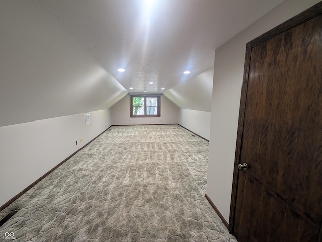8017 Dogwood Ct, Plainfield, IN 46168 - additional living space featuring carpet flooring, lofted ceiling, and recessed lighting