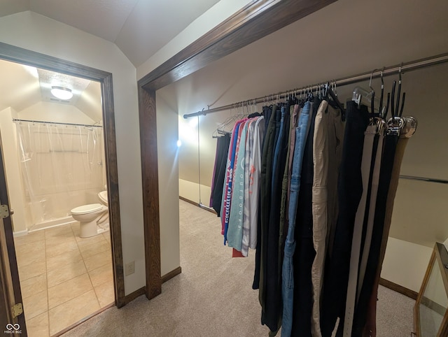 8017 Dogwood Ct, Plainfield, IN 46168 - walk in closet featuring vaulted ceiling and light colored carpet