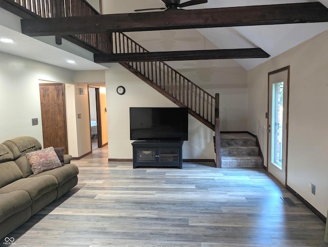 8017 Dogwood Ct, Plainfield, IN 46168 - living area with stairs, wood finished floors, recessed lighting, beam ceiling, and a ceiling fan