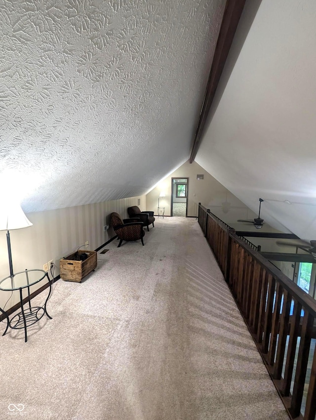8017 Dogwood Ct, Plainfield, IN 46168 - bonus room featuring carpet flooring, vaulted ceiling, a textured ceiling, and a ceiling fan