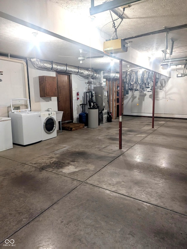 8017 Dogwood Ct, Plainfield, IN 46168 - garage with washing machine and clothes dryer and a garage door opener