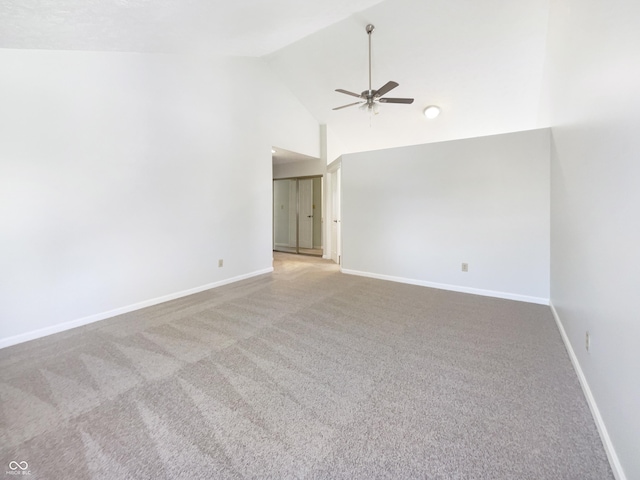 9162 Hadway Dr, Indianapolis, IN 46256 - spare room featuring baseboards, carpet, ceiling fan, and high vaulted ceiling