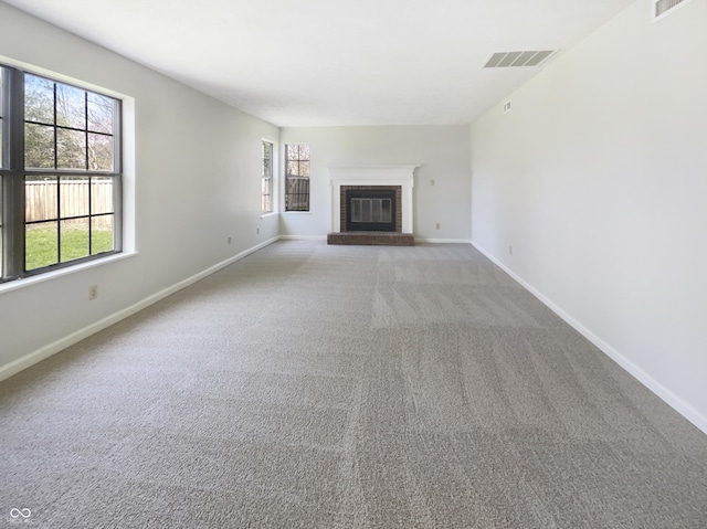 9162 Hadway Dr, Indianapolis, IN 46256 - unfurnished living room featuring carpet, visible vents, and plenty of natural light