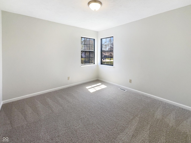 9162 Hadway Dr, Indianapolis, IN 46256 - carpeted empty room featuring baseboards and visible vents
