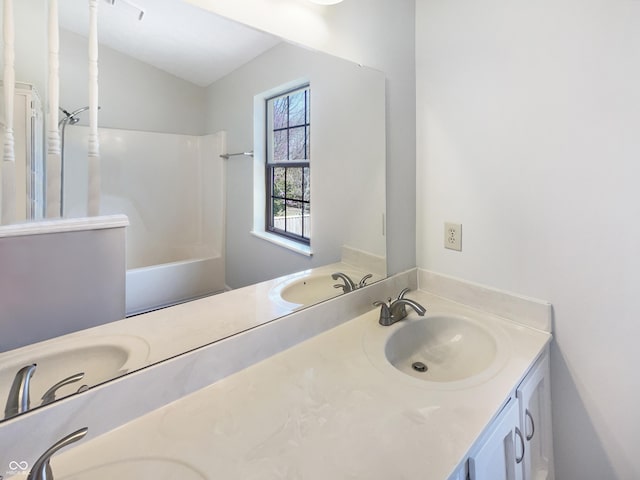 9162 Hadway Dr, Indianapolis, IN 46256 - full bath featuring washtub / shower combination, a sink, and double vanity