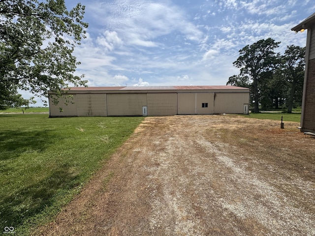 2365 E 850 N, Lebanon, IN 46052 - rear view of house with an outbuilding, a lawn, and an outdoor structure