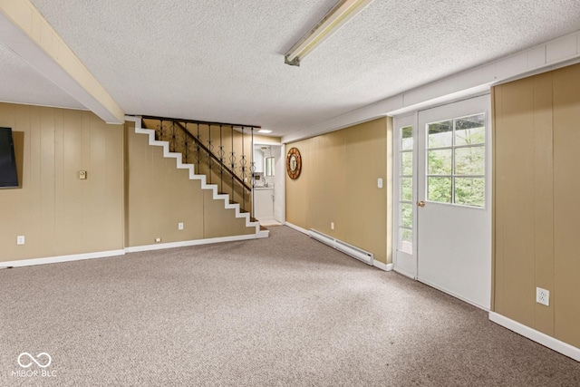 interior space with a baseboard radiator, stairs, a textured ceiling, and carpet floors