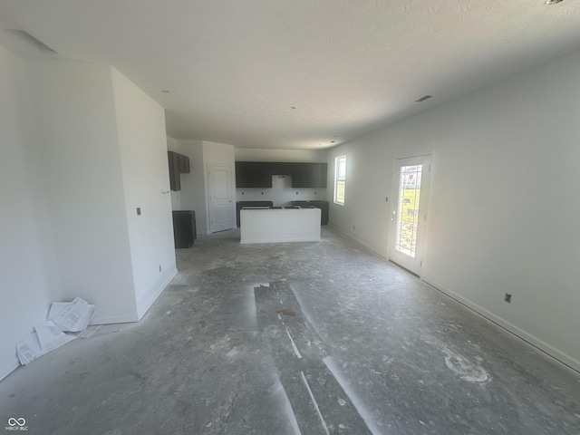 1656 Winn Ct, Fortville, IN 46040 - unfurnished living room with baseboards