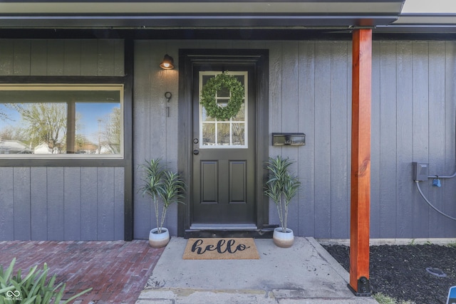 91 Crestview Dr, Greenwood, IN 46143 - doorway to property with board and batten siding and covered porch