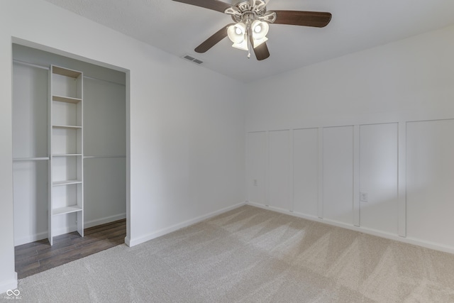 91 Crestview Dr, Greenwood, IN 46143 - unfurnished bedroom featuring carpet, visible vents, and a ceiling fan