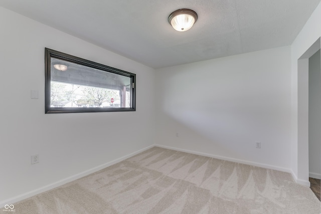 91 Crestview Dr, Greenwood, IN 46143 - spare room with baseboards and carpet