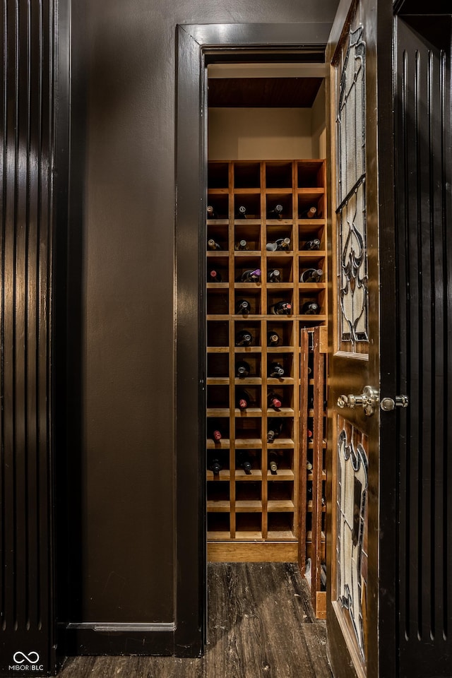 wine room with wood finished floors