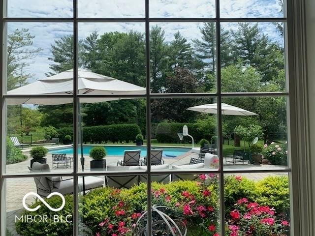outdoor pool featuring a patio area