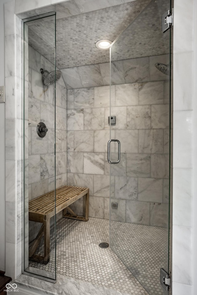 full bathroom featuring a shower stall
