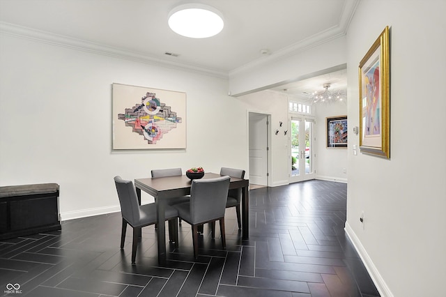 dining room featuring baseboards, ornamental molding, and ceiling fan