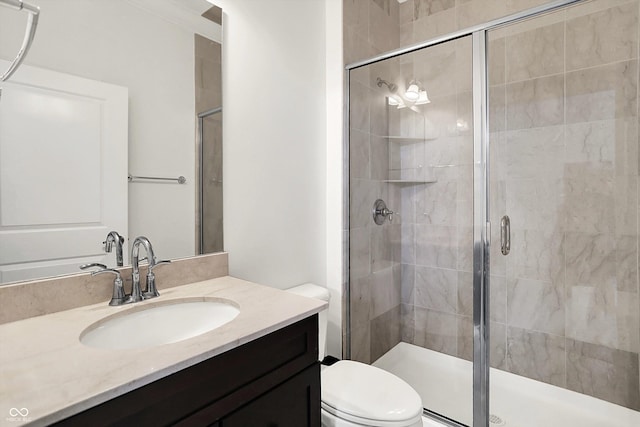 full bath with a shower stall, toilet, and vanity