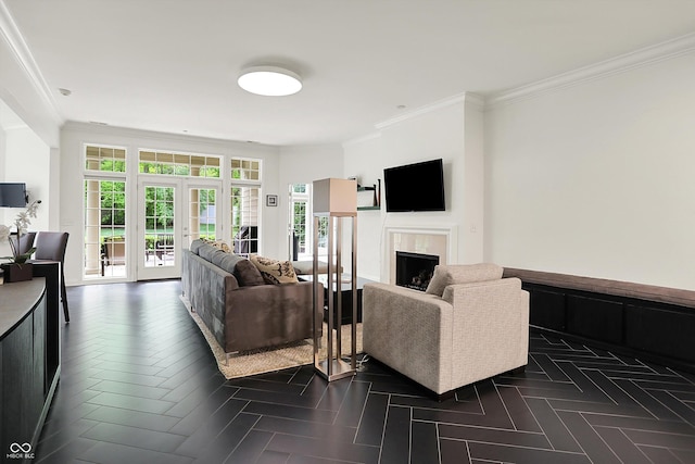 living room featuring a premium fireplace and ornamental molding