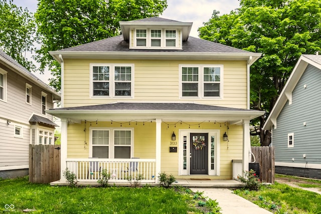 3133 Ruckle St, Indianapolis, IN 46205 - american foursquare style home with covered porch and roof with shingles