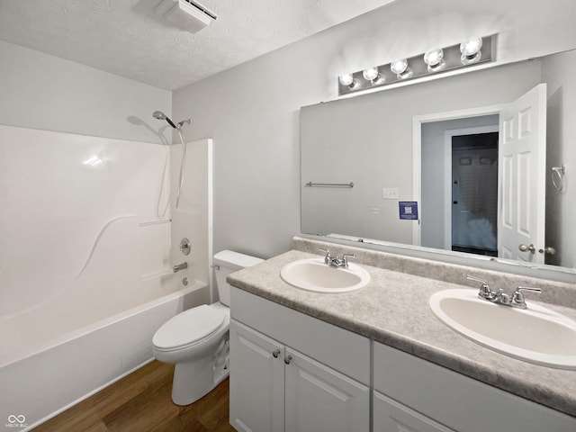 491 Westview Dr, Bargersville, IN 46106 - bathroom featuring wood finished floors, a sink, double vanity, and toilet
