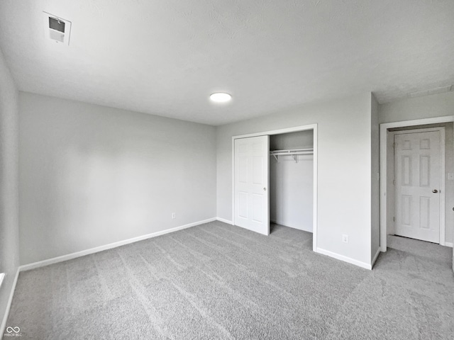 491 Westview Dr, Bargersville, IN 46106 - unfurnished bedroom with baseboards, carpet flooring, visible vents, and a closet