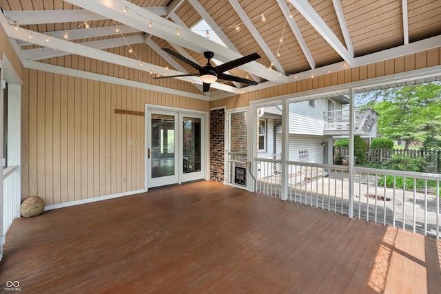 wooden deck featuring ceiling fan