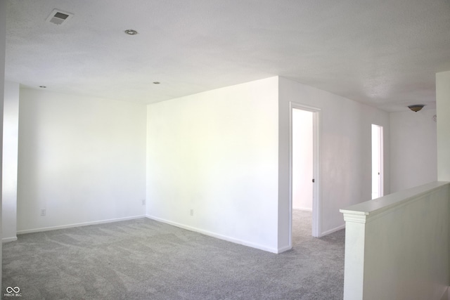 5236 Skipping Stone Dr, Indianapolis, IN 46237 - spare room featuring carpet and baseboards