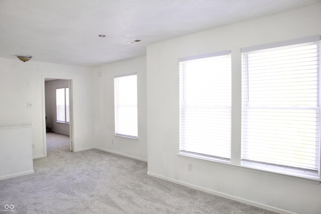 5236 Skipping Stone Dr, Indianapolis, IN 46237 - carpeted empty room featuring visible vents and baseboards