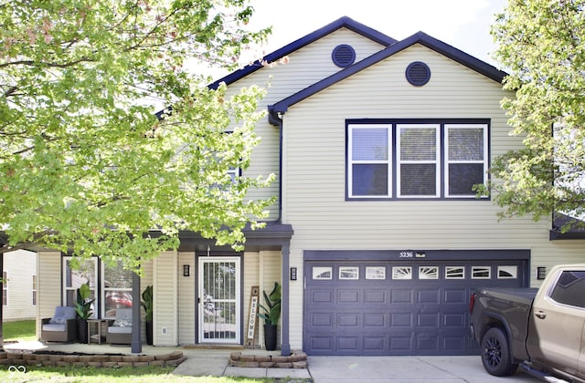 5236 Skipping Stone Dr, Indianapolis, IN 46237 - view of front of home featuring concrete driveway and a garage