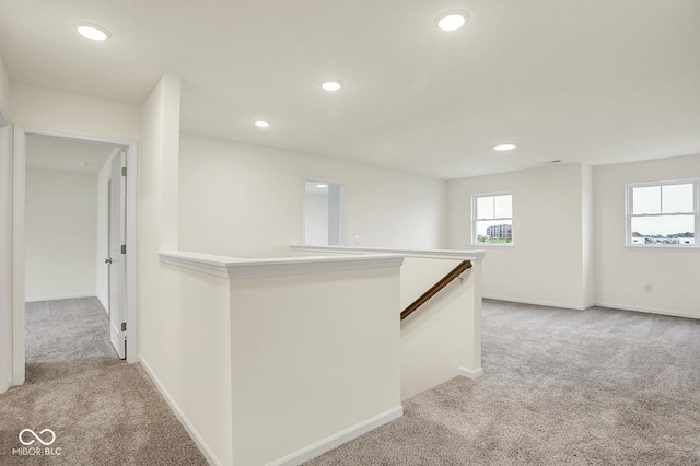 2712 Glade Ave, Plainfield, IN 46168 - hall featuring light colored carpet, an upstairs landing, recessed lighting, and baseboards