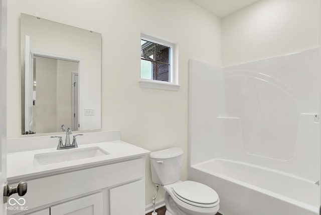 2712 Glade Ave, Plainfield, IN 46168 - bathroom featuring toilet, vanity, and bathing tub / shower combination