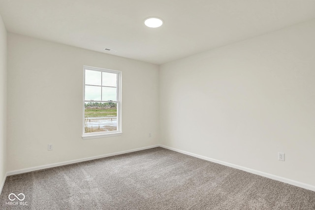 2712 Glade Ave, Plainfield, IN 46168 - spare room featuring carpet floors and baseboards