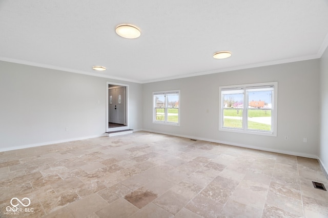 6519 Rothchild Blvd, Indianapolis, IN 46278 - empty room with stone finish floor, visible vents, crown molding, and baseboards
