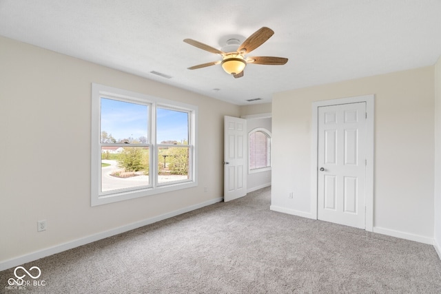 6519 Rothchild Blvd, Indianapolis, IN 46278 - unfurnished bedroom featuring visible vents, carpet flooring, baseboards, and a ceiling fan
