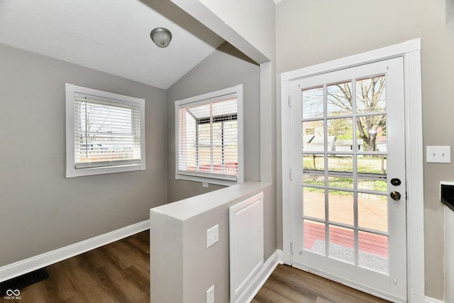 106 S Wayburn St, Indianapolis, IN 46229 - doorway to outside with dark wood-type flooring, lofted ceiling, and baseboards