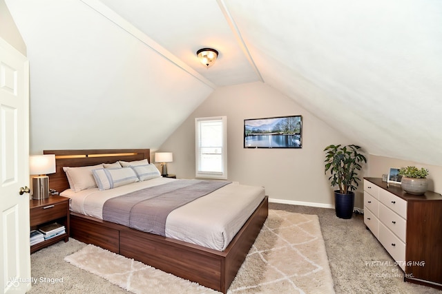 106 S Wayburn St, Indianapolis, IN 46229 - bedroom with vaulted ceiling, carpet flooring, and baseboards