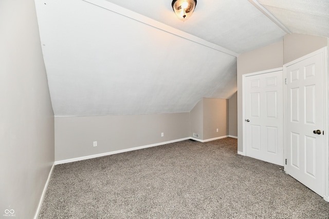 106 S Wayburn St, Indianapolis, IN 46229 - additional living space featuring vaulted ceiling, carpet floors, and baseboards
