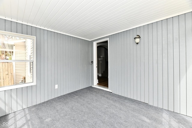106 S Wayburn St, Indianapolis, IN 46229 - carpeted spare room featuring wood walls