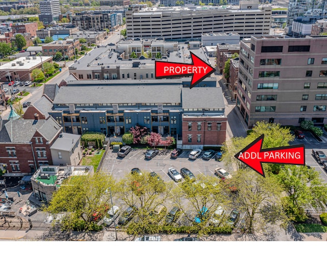 birds eye view of property with a view of city
