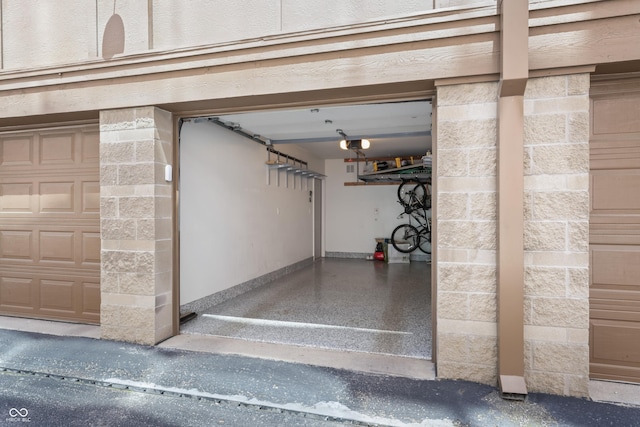 garage featuring baseboards