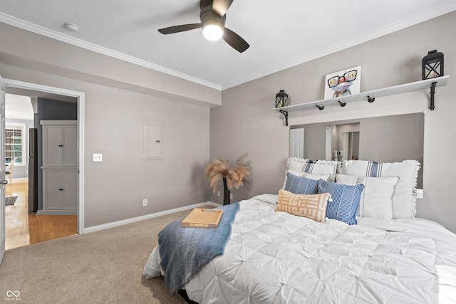 carpeted bedroom with baseboards, ornamental molding, electric panel, and a ceiling fan