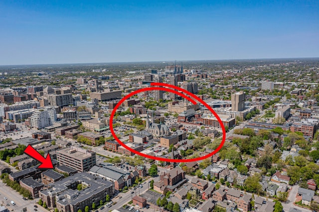 birds eye view of property with a view of city