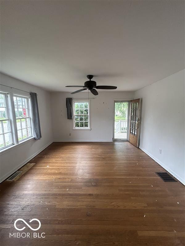 1640 Lawton Ave, Columbus, IN 47201 - unfurnished room featuring wood finished floors and a ceiling fan